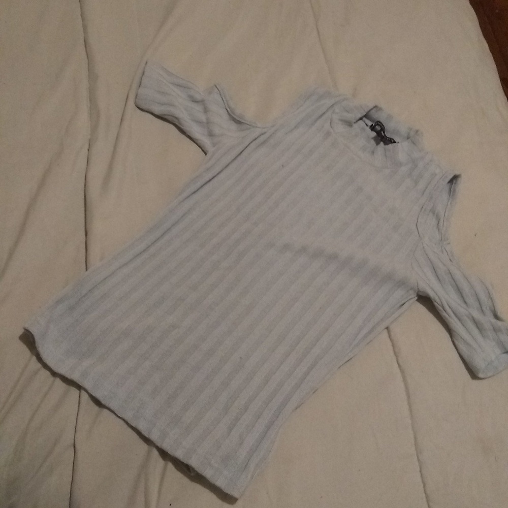 light blue ribbed top.